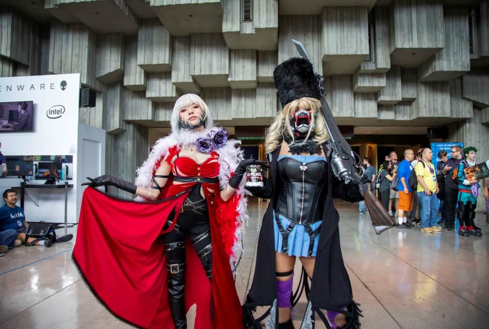 code vein eva and mia cosplays at pax west 2019 are holding a g fuel type-o tub